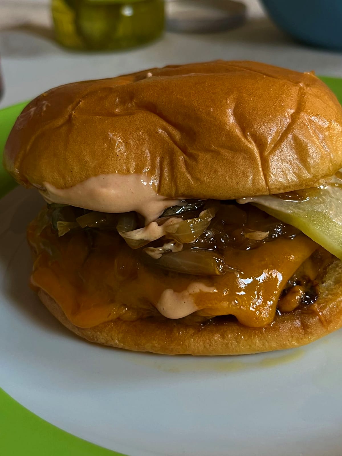 Smash cheeseburger with melted cheese and onions